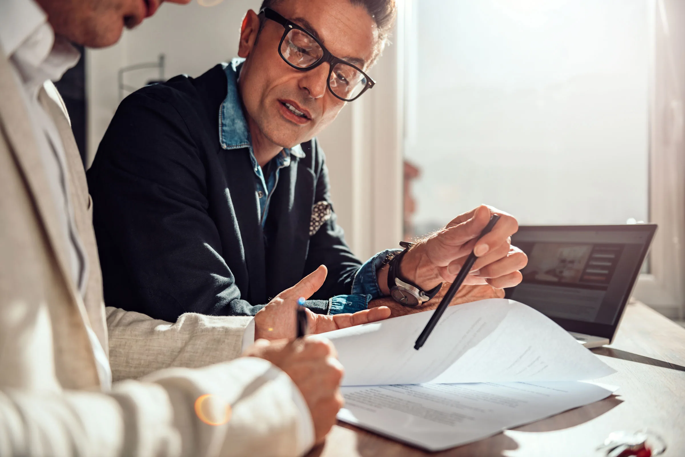 Property buyer reviewing legal and financial documents for a Limassol purchase
